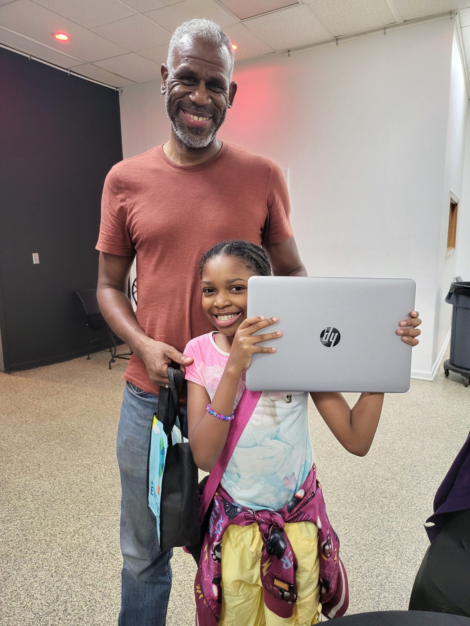Father DaughterComputerDonation