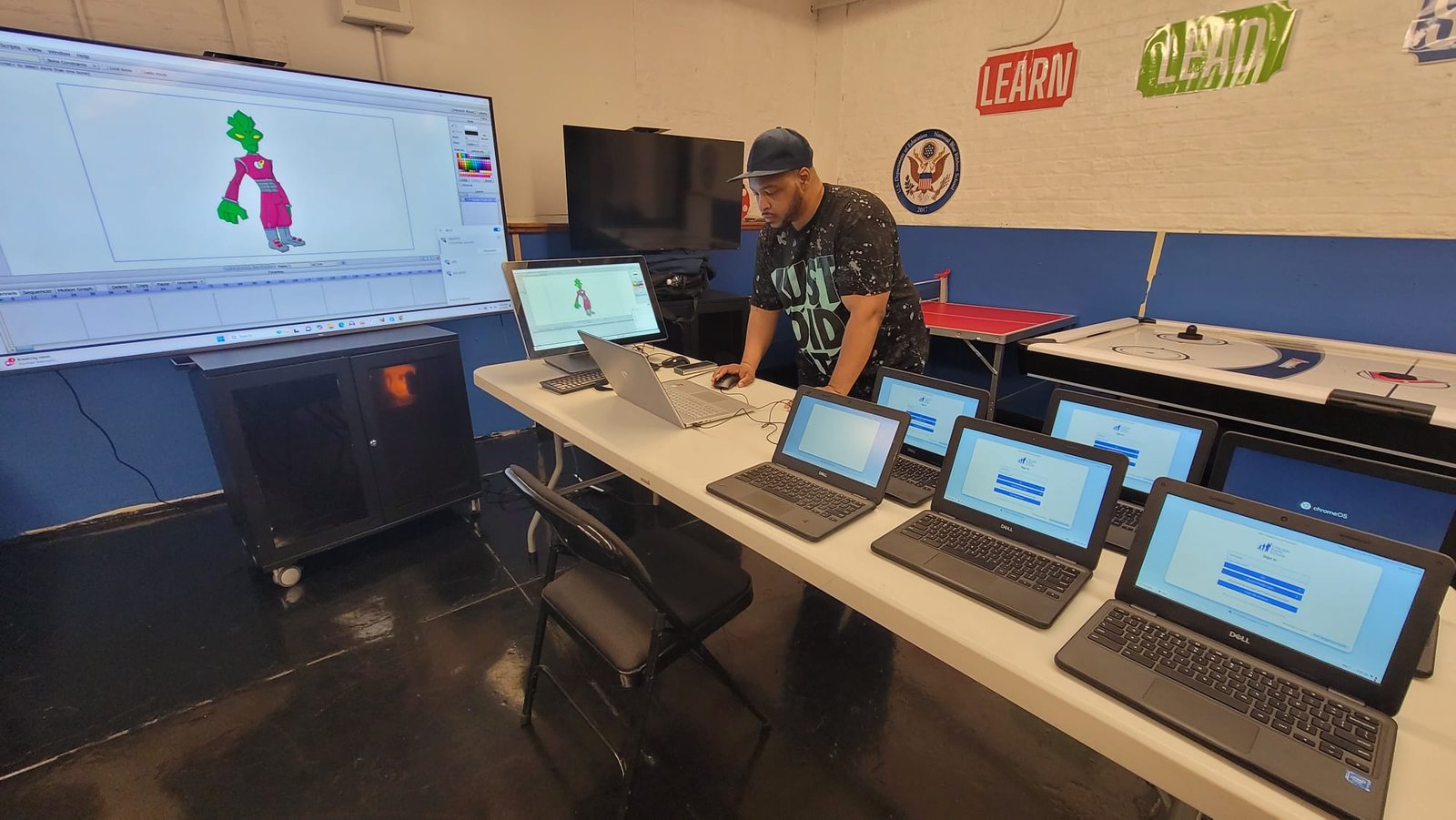 Quittman at POE Setting Up Laptops